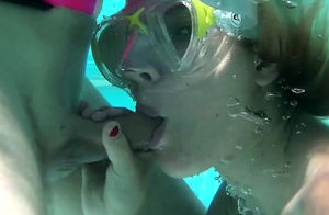 David and Samantha Cruz underwater